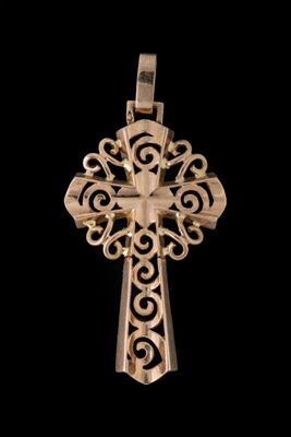 l'image d'une croix argentée sur fond noir