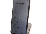 a phone that is sitting on top of a stand