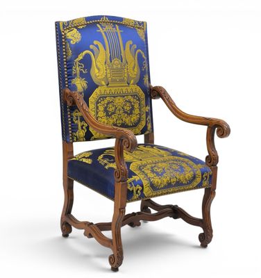 a blue and yellow chair with a gold and blue pattern