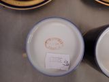 two cups and a saucer on the table