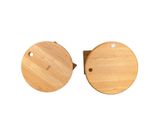 two wooden fish shaped cutting boards on a white surface