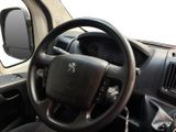 a steering wheel and dashboard of a vehicle in a car