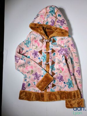 a picture of a pink jacket with a brown hoodie
