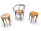 three chairs and a table on a white background