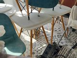 many chairs that are lined up in a room