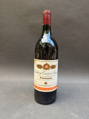 a bottle of wine that is sitting on a table