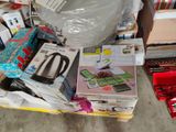 a pile of kitchen appliances and appliances on the floor