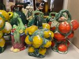a lot of figurines that are sitting on a shelf