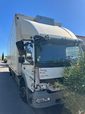 a truck that is parked on the side of the road