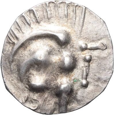 une image représentant une pièce d'argent sur laquelle figure le portrait d'un homme
