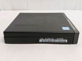 the dvd player is sitting on a white surface with a barcode on it