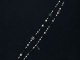 a rosary with a cross and a star on a black background