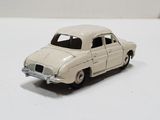 a toy car that is sitting on a white surface