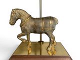 a statue of a horse with a saddle on it