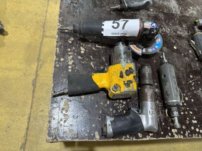 a lot of tools that are laying out on the floor