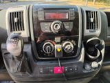 a car dashboard with a clock and a radio in it