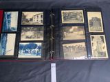 an old photo album with a lot of old photos on it