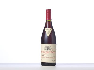 a bottle of wine that is sitting on a table