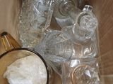 a box with a lot of glass items inside of it