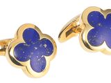 une paire de boutons de manchette en or sertis de lapis-lazuli et de pierres bleues