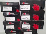 several boxes of u - power products are stacked on top of each other