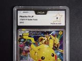 a close up of a pokemon trading card on a table