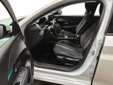 the interior of a car with the door open and the driver ' s seat down