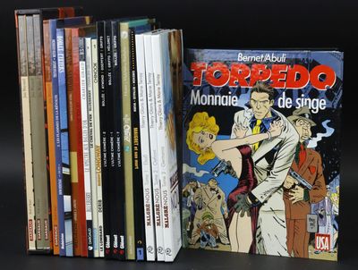 a lot of books that are sitting on a shelf