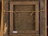 an old picture frame with a rope around it on a wooden easel