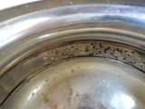 a close up view of a metal bowl with a metal lid