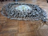 a large piece of art that is on the floor