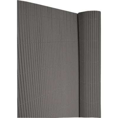 un gros plan sur un mur gris orné de lignes verticales