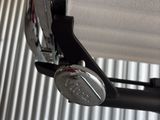 a close up of a metal object on a metal surface