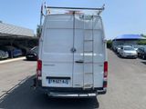 a white van that is parked in a parking lot