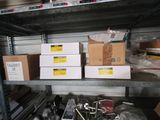 many boxes on a shelf in a garage