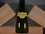 a bottle of wine that is sitting on a table