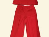 a picture of a woman ' s red top and pants