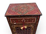 an image of a small wooden box with a decorative design