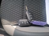 a car key sitting on the back seat of a car
