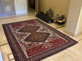 a large area rug on the floor in a room