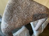 a chair that has been wrapped up with plastic