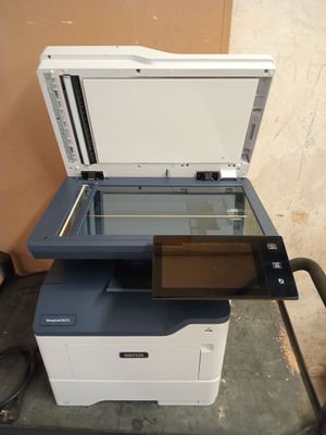 an image of a printer sitting on top of a table