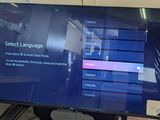 a flat screen tv that is sitting on a table