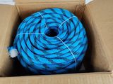 a box with a blue hose inside of it