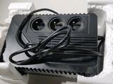a power strip attached to the back of an electrical device