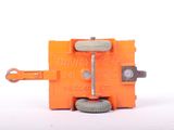 a close up of a small orange device on a white surface