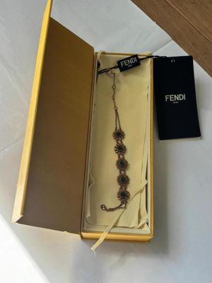 FENDI - Bracelet FENDI Roma en métal doré et malachite.