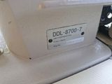 a close up of a sewing machine with a label on it
