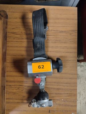 a small machine that is sitting on a wooden table