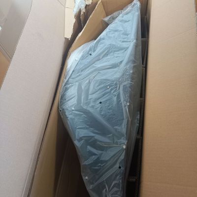 a box with a mattress in it and a box with a mattress in it